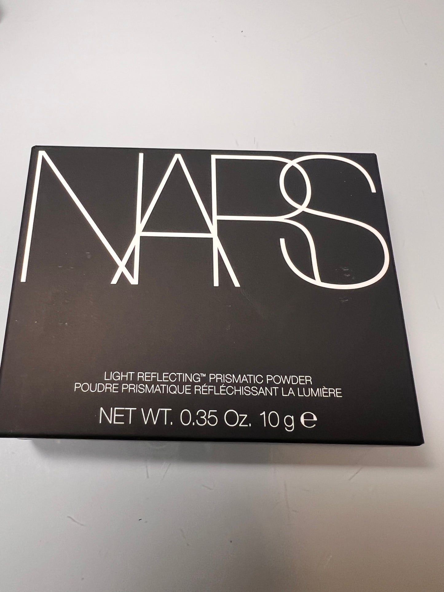 LIGTH REFLECTING PRASMATIC POWDER-INTERESTELLAR-NARS- PRODUCTO ORIGINAL EXISTENCIAS LIMITADAS